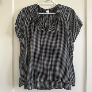 Black and white check V-neck blouse. Size L. Versatile styling - dress up/down.